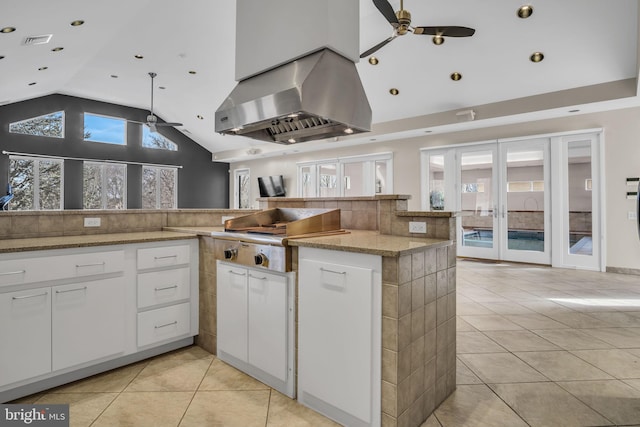 kitchen featuring range hood, visible vents, ceiling fan, and french doors