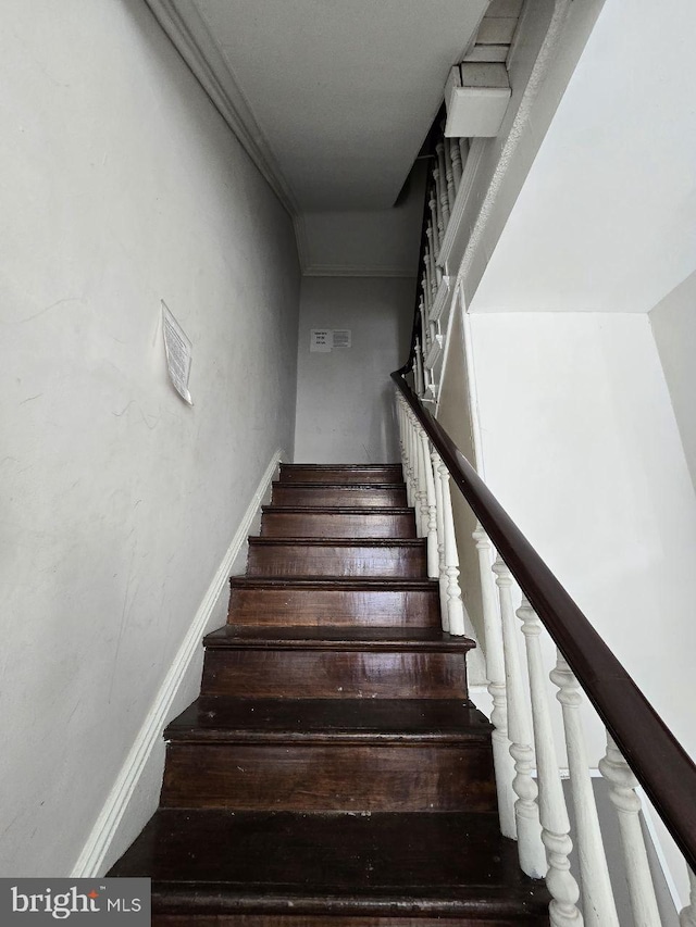 staircase with baseboards