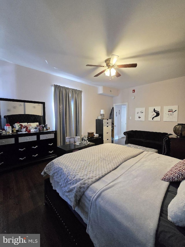 bedroom featuring ceiling fan and wood finished floors