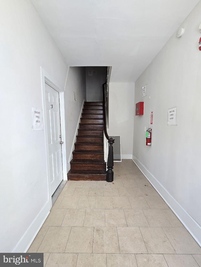 stairway with baseboards