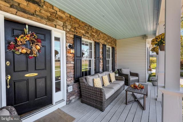 wooden deck featuring a porch