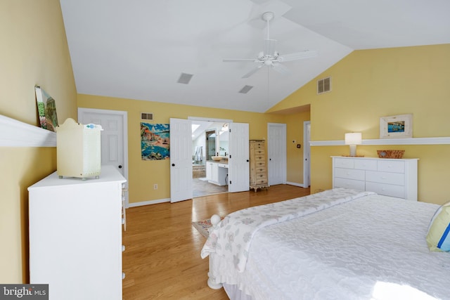 bedroom with ensuite bath, light wood-style floors, visible vents, and baseboards