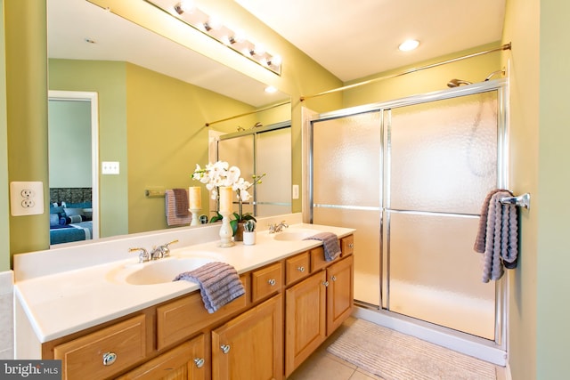 10202 Sherman Heights Pl Unit 48, Columbia, MD 21044 - full bathroom featuring connected bathroom, double vanity, an enclosed shower, and tile patterned floors