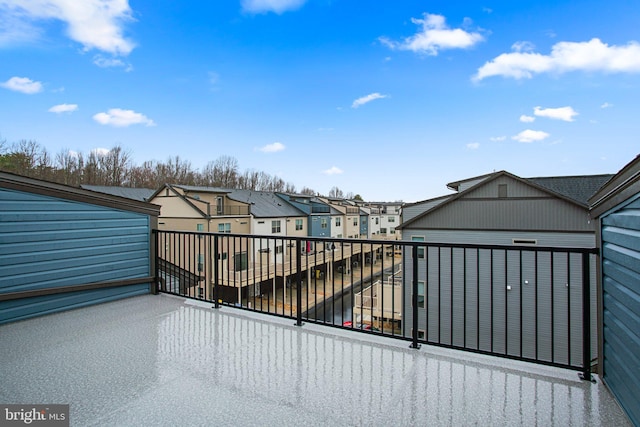 view of gate with a residential view