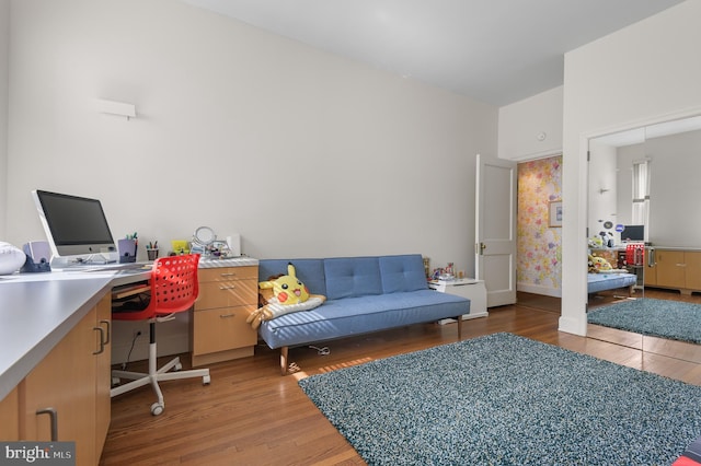 office with baseboards and wood finished floors