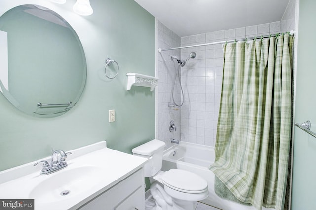 full bath with toilet, shower / bath combo, and vanity