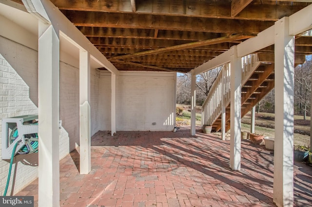 view of patio with stairway