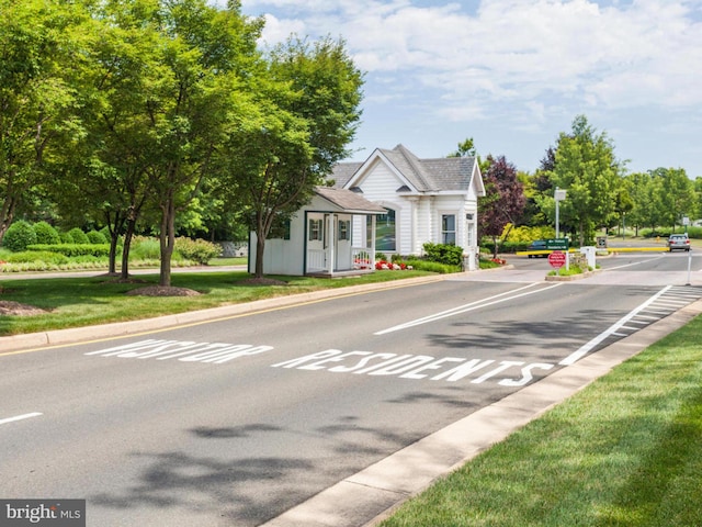 view of street featuring curbs