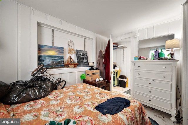 bedroom with marble finish floor