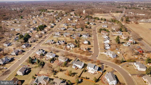 birds eye view of property with a residential view