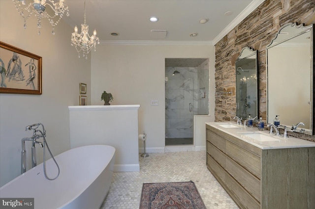 bathroom with ornamental molding, a chandelier, a soaking tub, and a shower stall