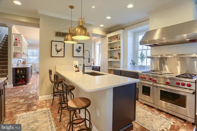 kitchen with range with two ovens, extractor fan, brick floor, baseboards, and open shelves