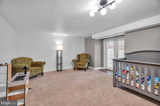 bedroom featuring access to exterior, baseboards, carpet flooring, and french doors