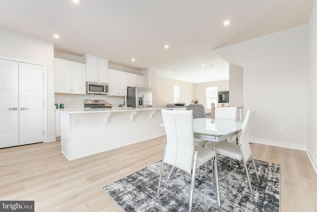153 Glory Maple Ln, Downingtown, PA 19335 - dining space featuring recessed lighting, light wood-style floors, and baseboards