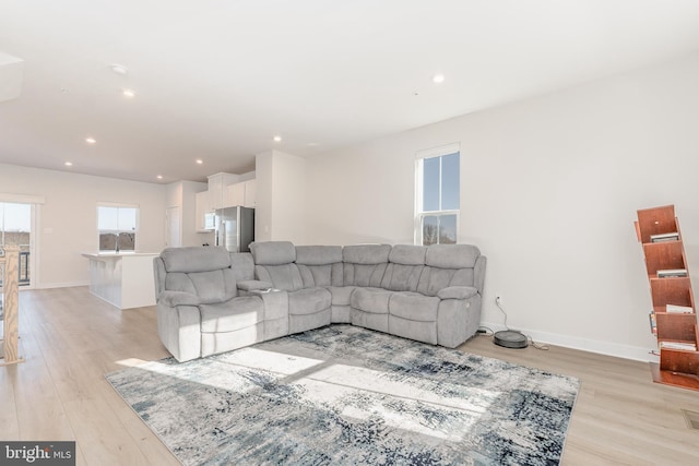 153 Glory Maple Ln, Downingtown, PA 19335 - living room featuring recessed lighting, baseboards, and light wood finished floors