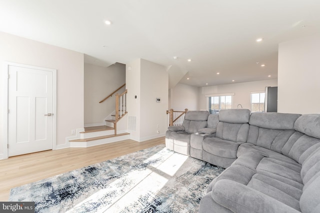 153 Glory Maple Ln, Downingtown, PA 19335 - living room featuring recessed lighting, light wood-type flooring, baseboards, and stairs