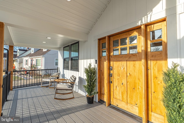 wooden terrace with a porch