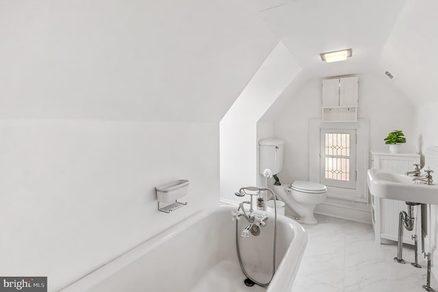 full bathroom featuring visible vents, a washtub, toilet, vaulted ceiling, and marble finish floor