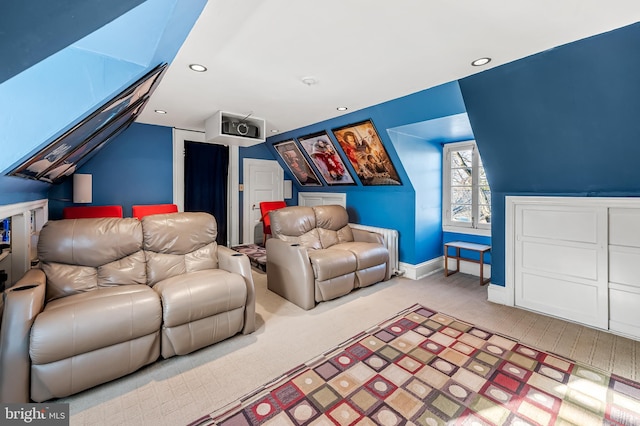 home theater room featuring recessed lighting, baseboards, carpet, and lofted ceiling