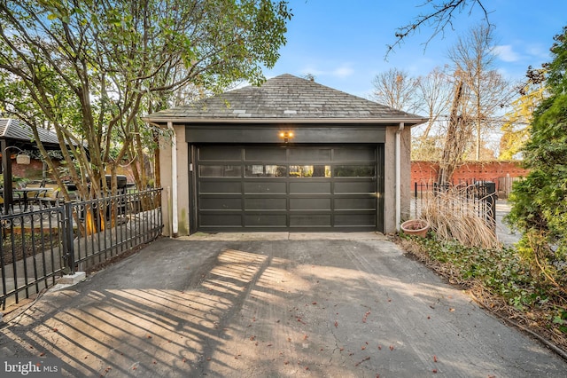 detached garage with fence