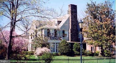 exterior space with fence and a chimney