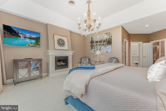 bedroom featuring visible vents, baseboards, carpet flooring, a fireplace, and a notable chandelier