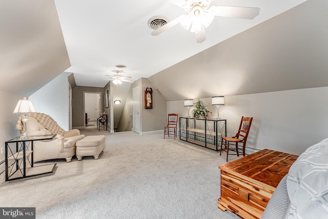 living area with visible vents, baseboards, ceiling fan, lofted ceiling, and carpet floors