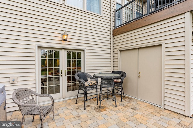 view of patio featuring french doors