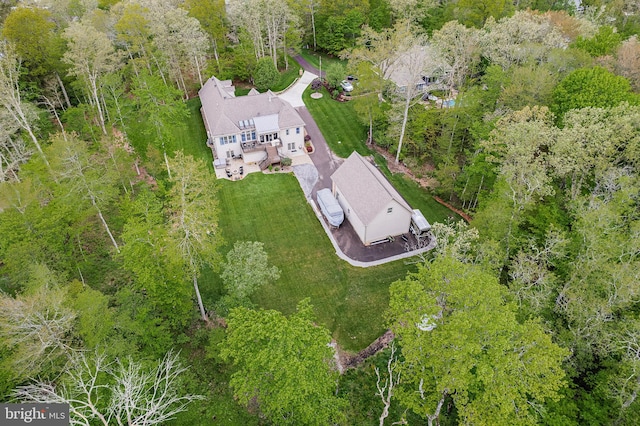 aerial view with a wooded view