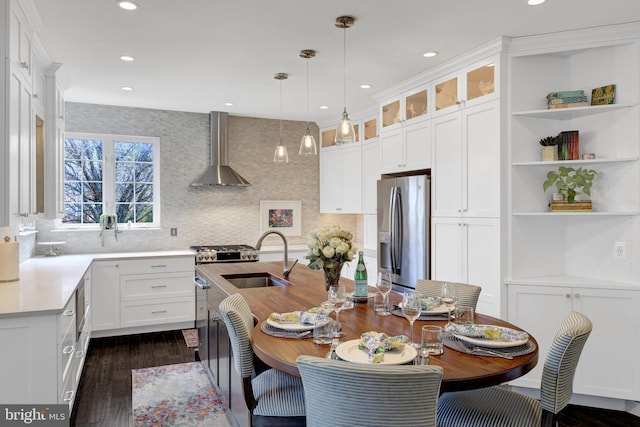 dining area featuring dark wood-style floors and recessed lighting