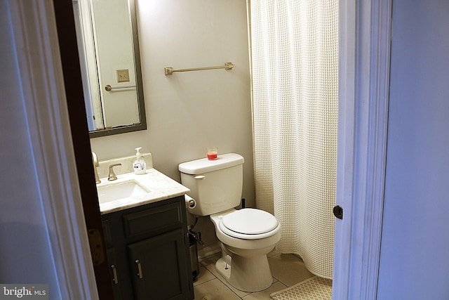 full bath with vanity, a shower with shower curtain, tile patterned flooring, and toilet