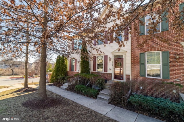 multi unit property featuring brick siding