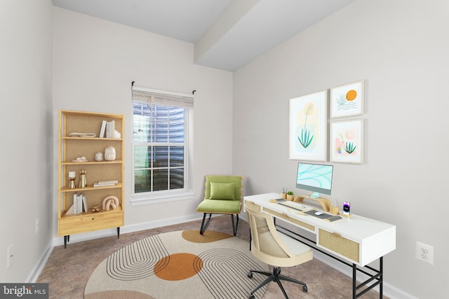 office area with plenty of natural light and baseboards