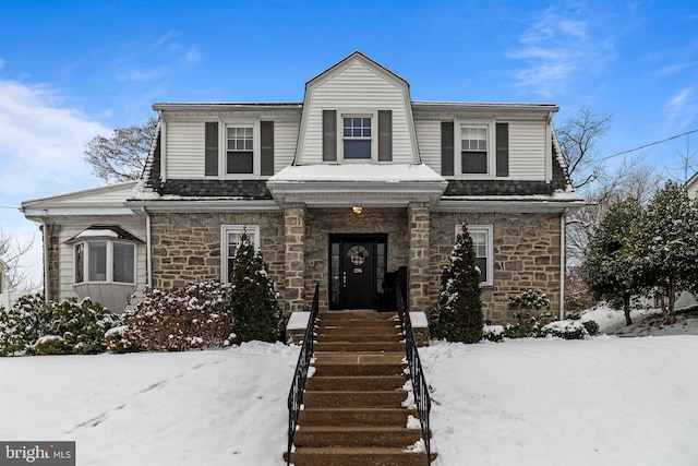 view of front of home featuring stone siding