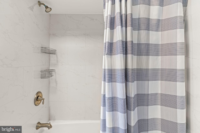 full bath featuring shower / bathtub combination with curtain