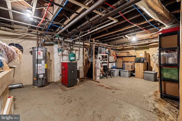 unfinished basement with a heating unit and gas water heater