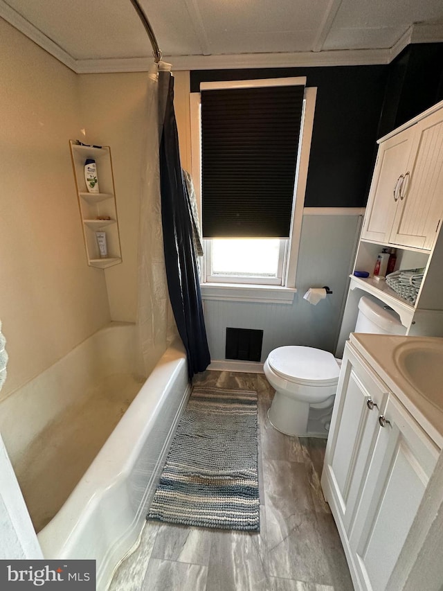 full bath with toilet, visible vents, shower / bath combo with shower curtain, and vanity