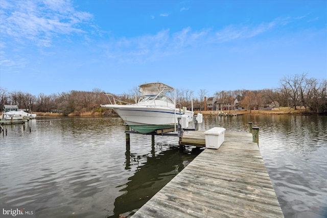 view of dock with a water view and boat lift