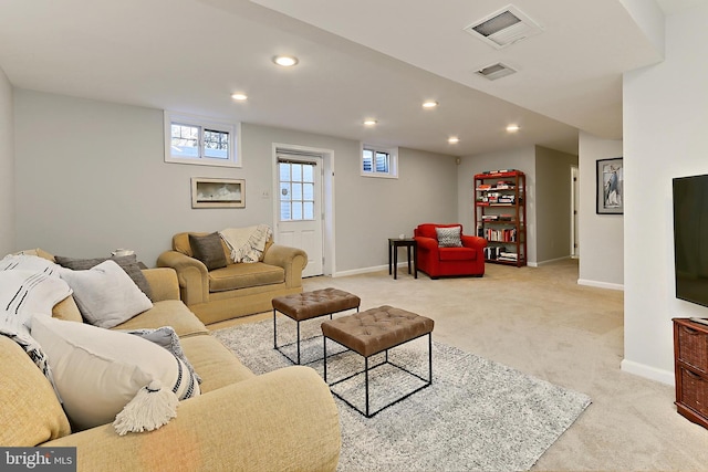 living room with light colored carpet, visible vents, baseboards, and recessed lighting