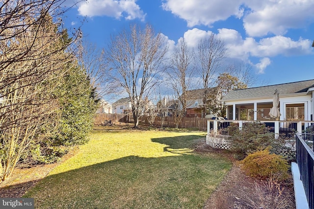 view of yard with fence