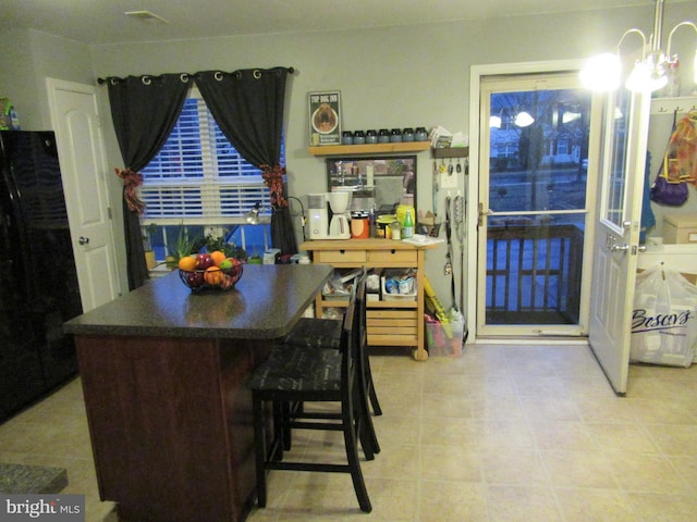 dining area with a chandelier