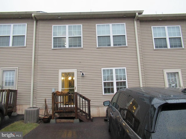 view of front of home with cooling unit