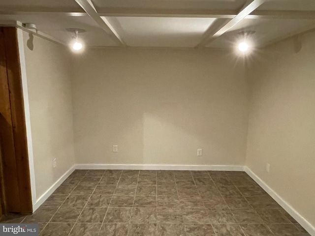 empty room with baseboards