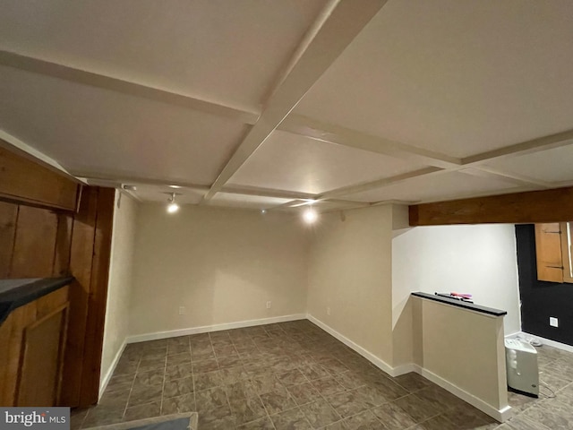 finished basement featuring baseboards