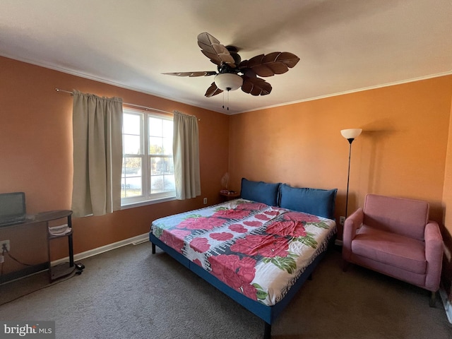 bedroom with carpet floors, crown molding, baseboards, and a ceiling fan