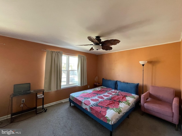 carpeted bedroom featuring crown molding, baseboards, and ceiling fan