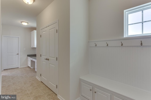 mudroom featuring light tile patterned floors