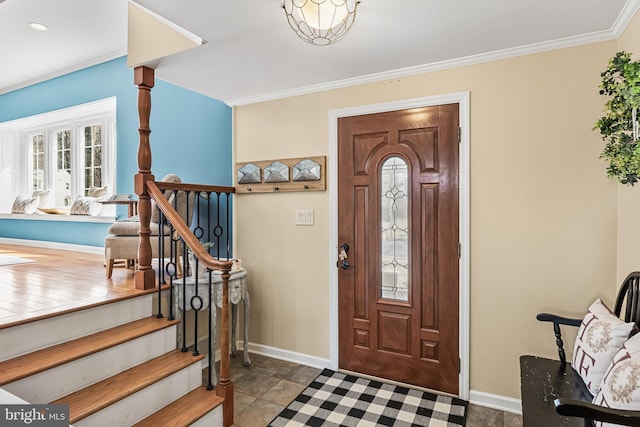 foyer entrance with stairway, recessed lighting, baseboards, and ornamental molding