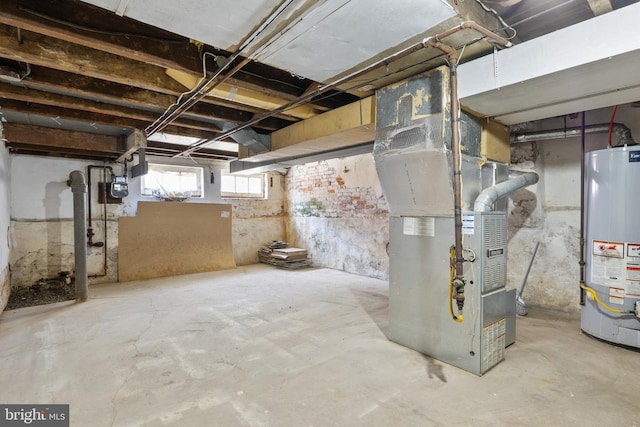 basement with gas water heater and heating unit