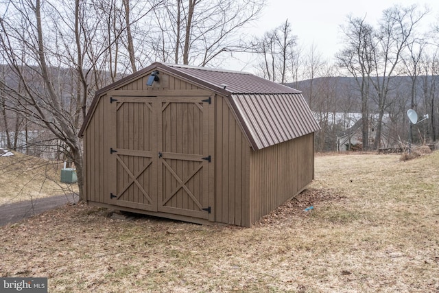 view of shed with a mountain view